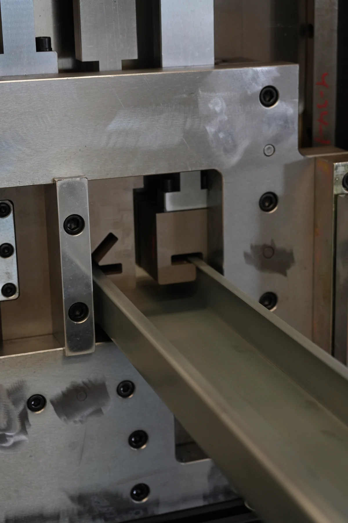 Formed metal profile leaving a cut-off die in our Xiamen production base