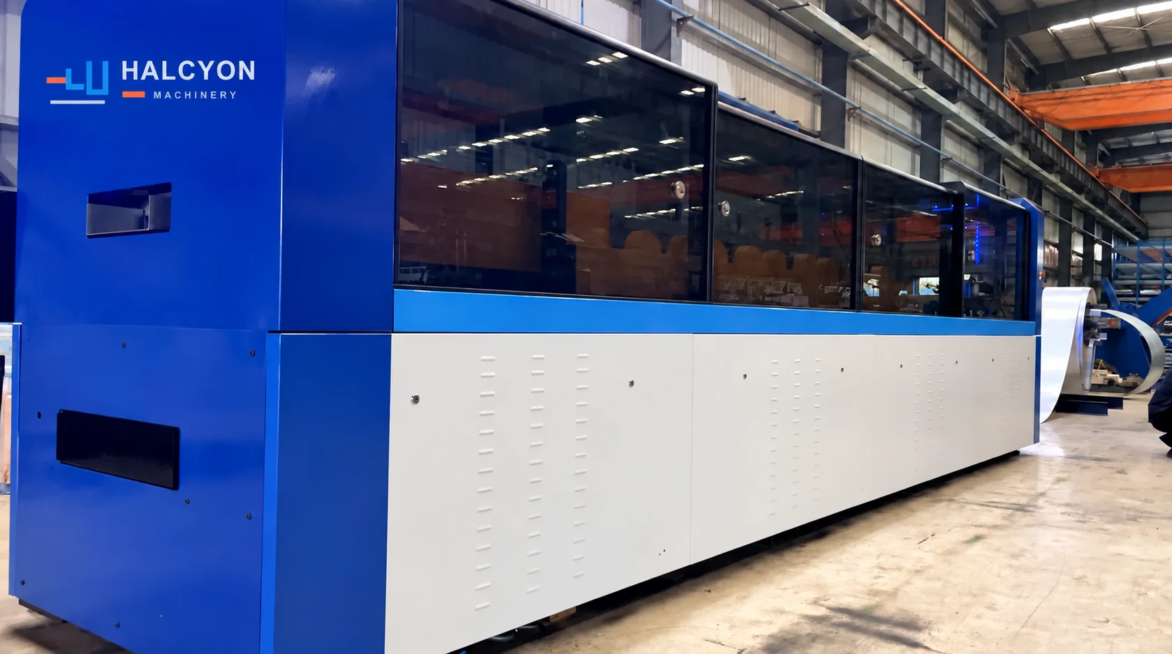 HLG-300 structural floor framing machine photographed at our Xiamen production base; Halcyon logo digitally overlaid